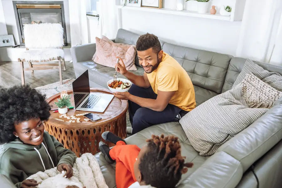 Family relaxing together in a lounge