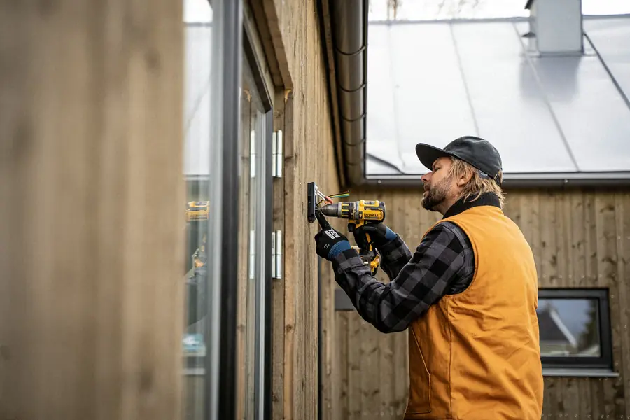 Tradesperson fitting out a timber building